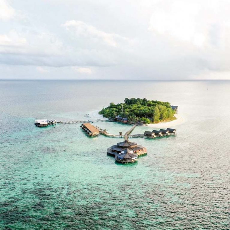 This pristine dive spot in Sabah is nestled on a tiny island in the ...